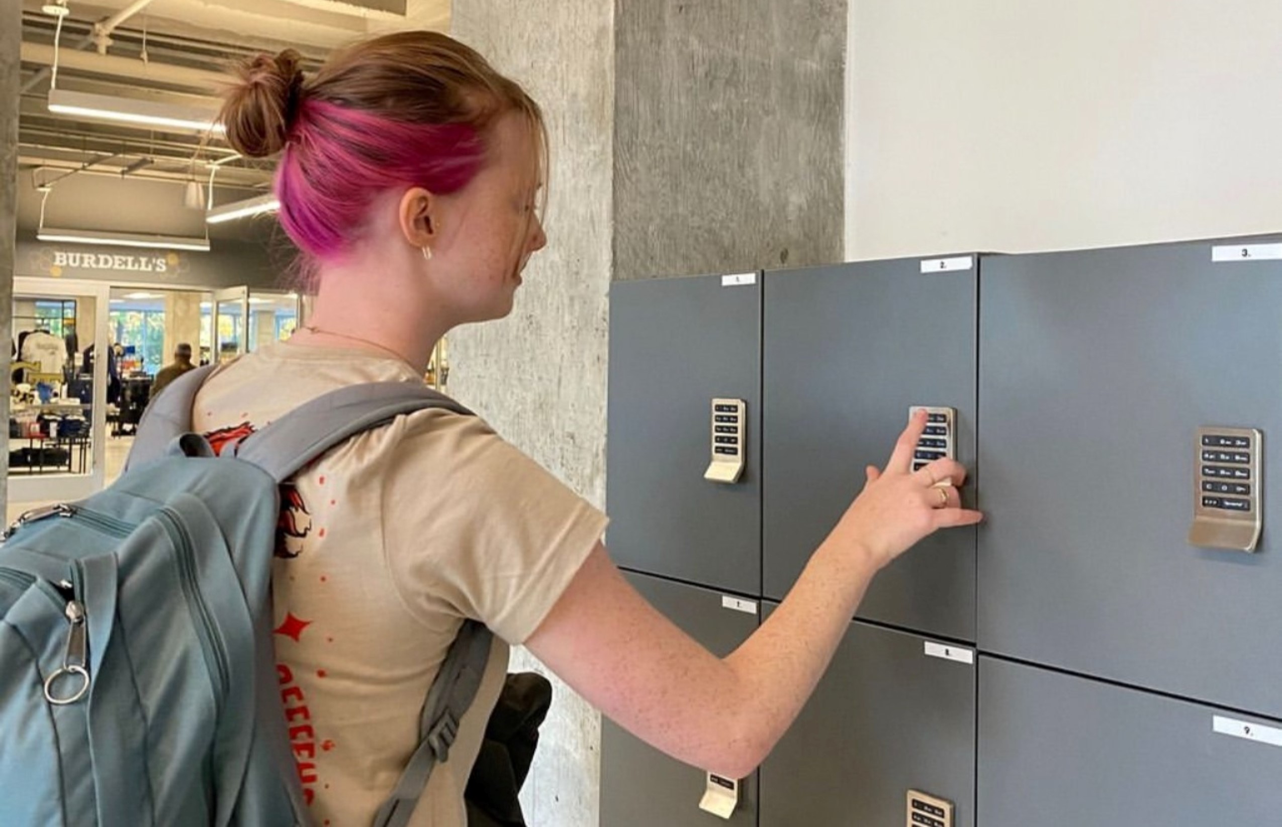 student at locker